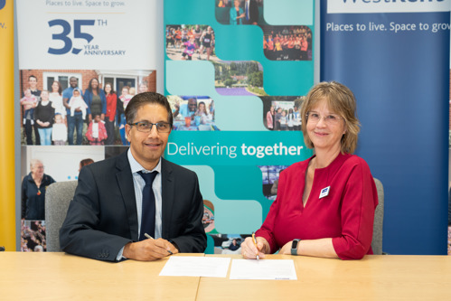 Tracy Allison, Chief Executive of West Kent with Dr Pav Ramewal, Chief Executive of Sevenoaks District Council, signing the new partnership agreement.